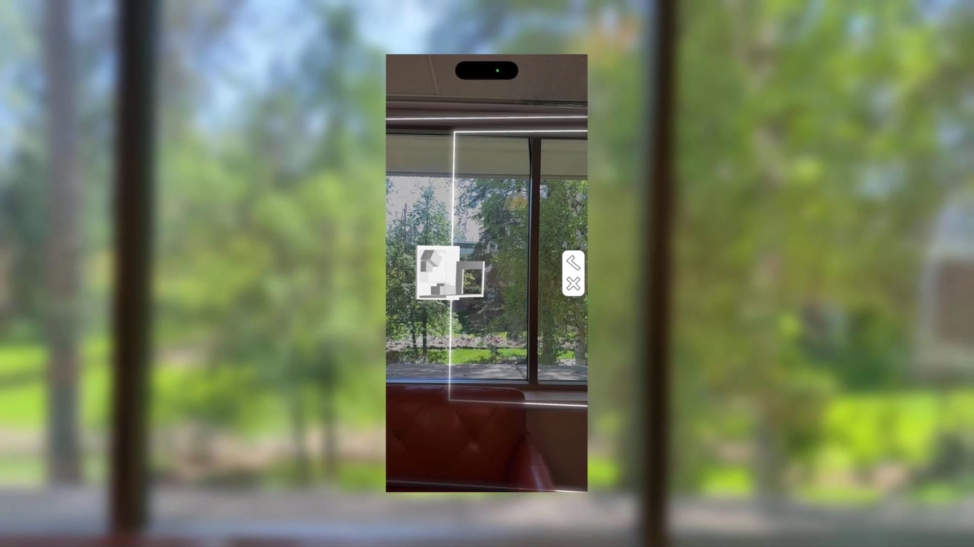 Video of a LiDAR scan by As-Built in a room with windows, sofas, and a computer