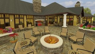 This giant stone patio in the backyard of a large home easily seats eight around the fire pit and a dozen more in the other spaces defined by planters and covered patio areas.