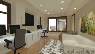 A long home-office space with glass counters and work stations along one wall, and comfortable seating along the opposing wall with TV views.