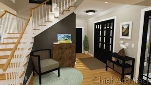 A nautically inspired entry is inviting thanks to the open view of the L-shaped staircase, the neutral and interesting grey colors, and casual furniture.